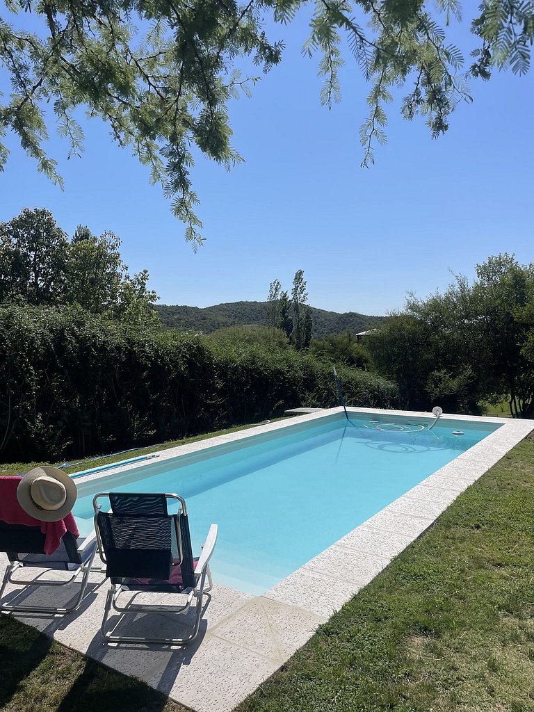 House with pool in golf community